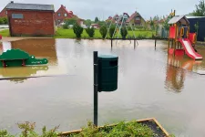 Photograph of a flooded playground.